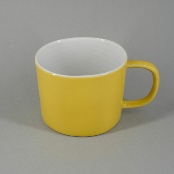 Yellow hand painted stoneware mug